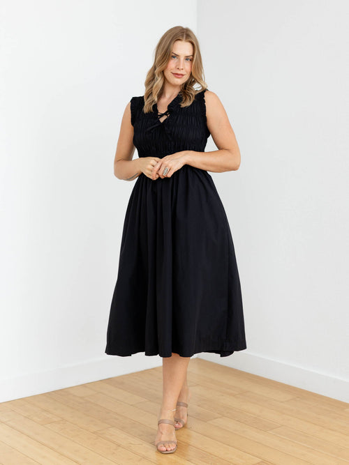 black smocked tie front midi dress