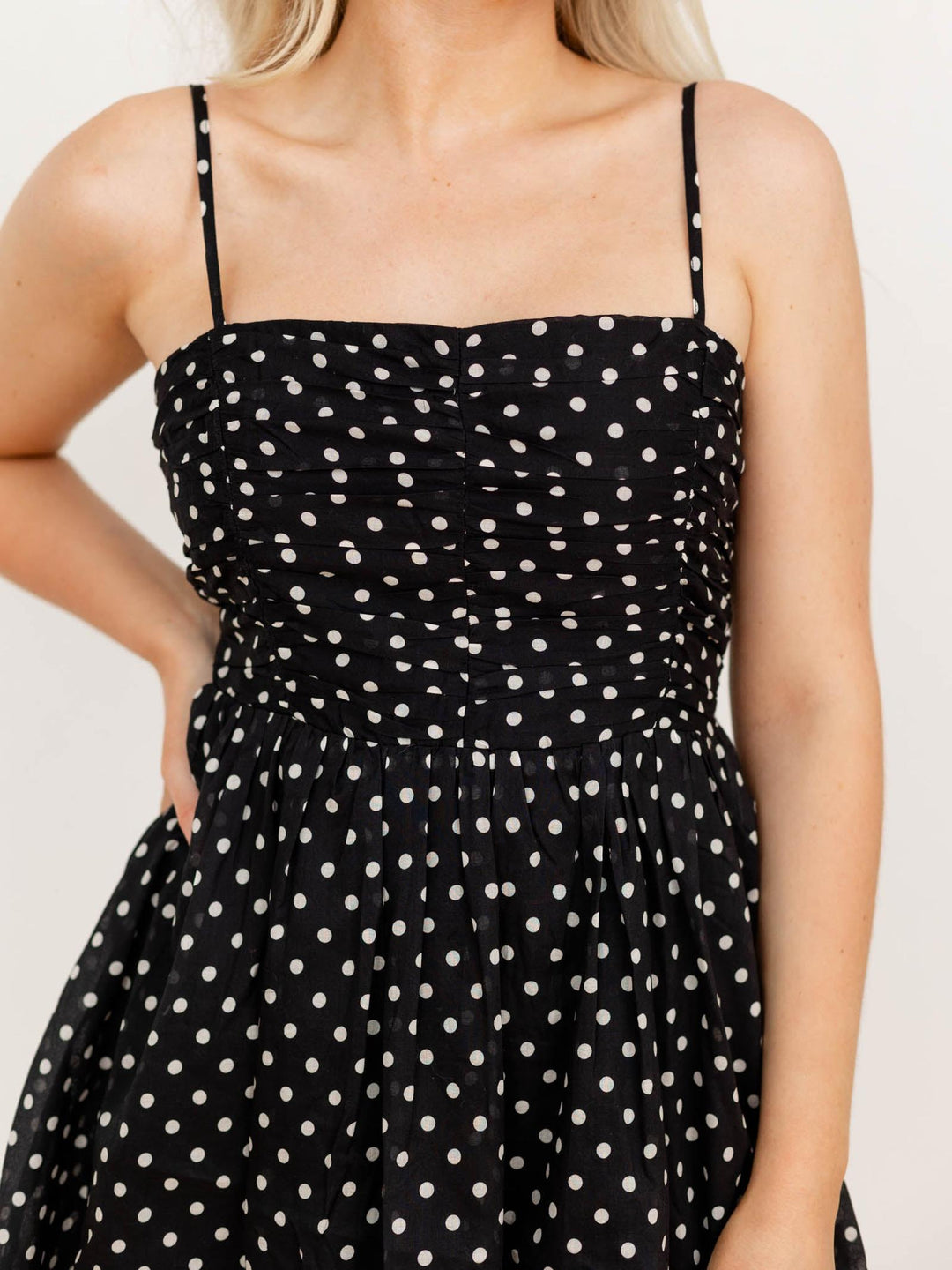 black and white polka dot mini dress