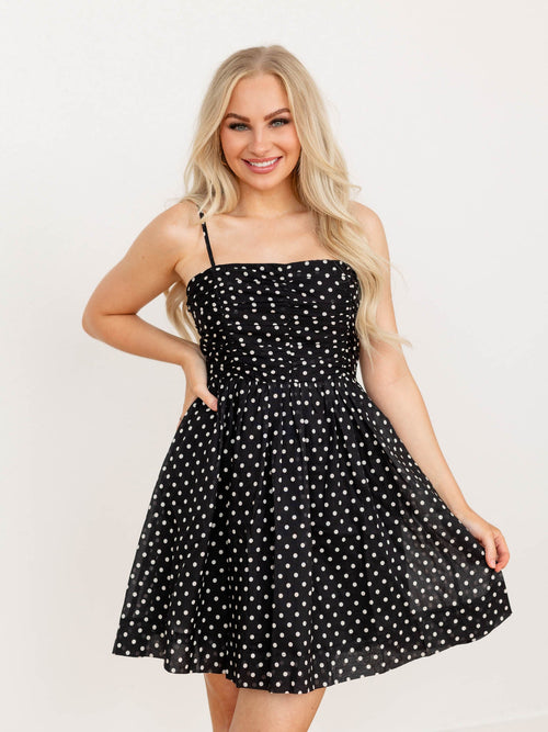 black and white polka dot mini dress