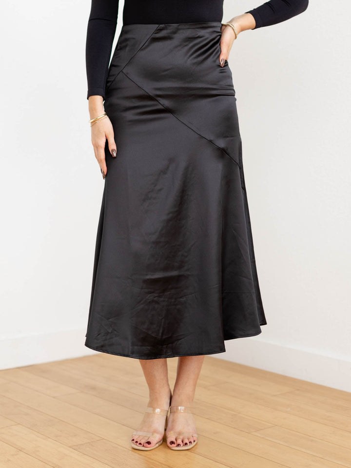black pieced midi skirt