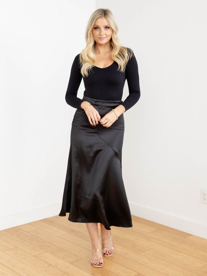 black pieced midi skirt