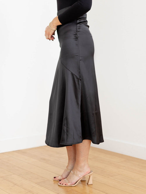 black pieced midi skirt