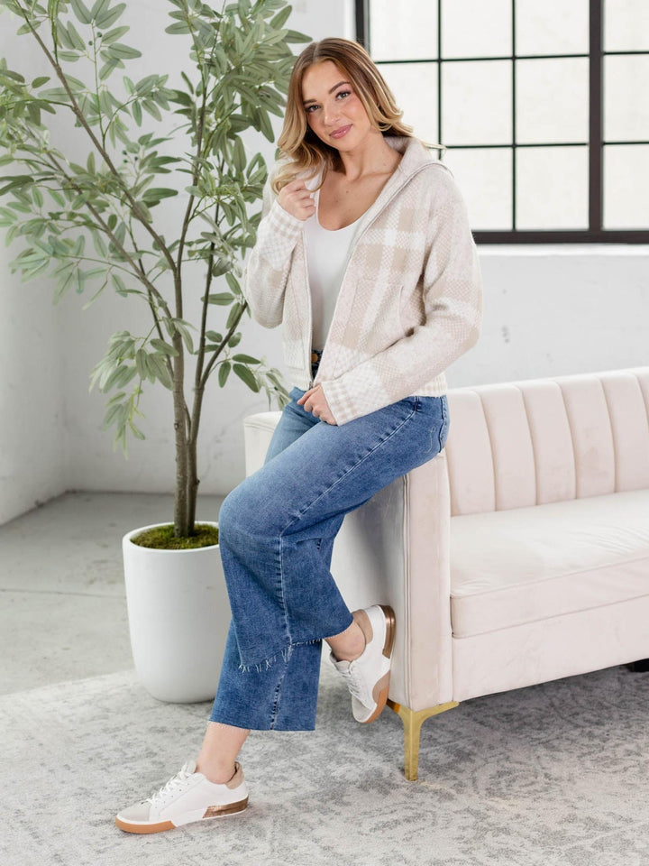 tan and white checkered bomber jacket