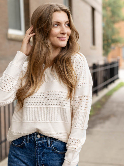 cream pointelle vneck sweater