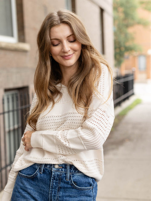cream pointelle vneck sweater
