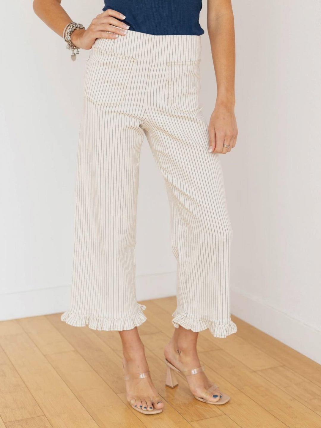 STRIPE RUFFLE HEM ANKLE PANTS