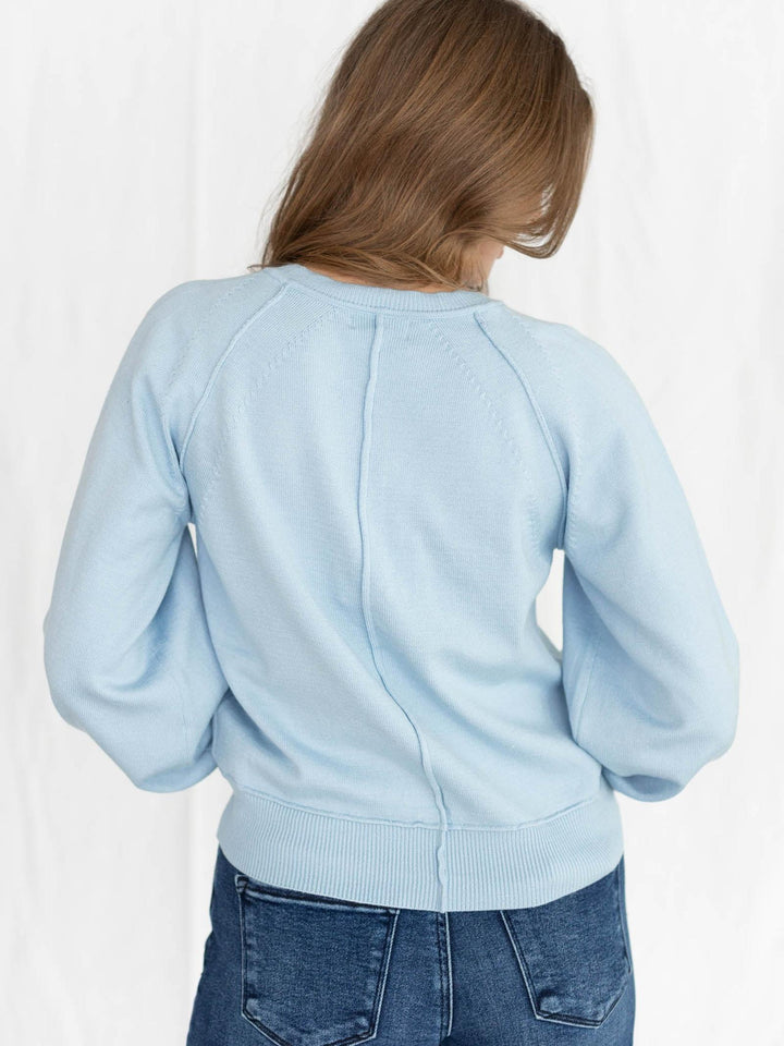 light blue half button sweater