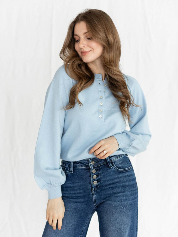 light blue half button sweater