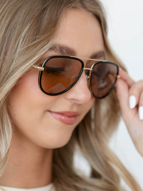 black and gold aviator sunglasses