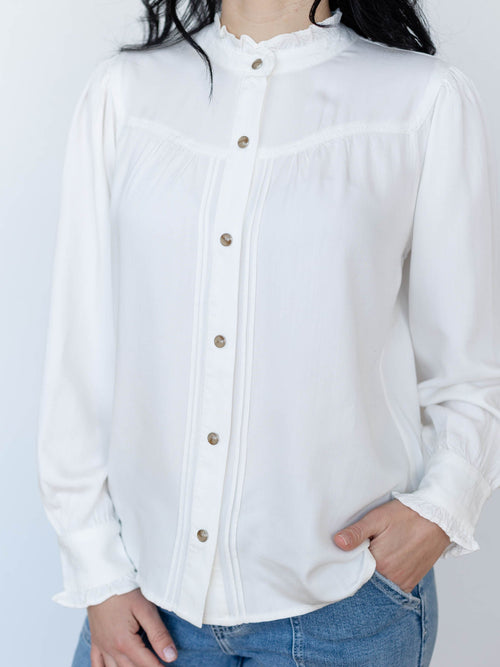 white mock neck button front blouse