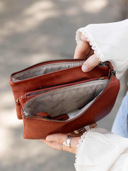 rust soft sided crossbody bag