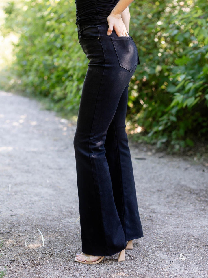RISEN Black High Rise Raw Cut Flare