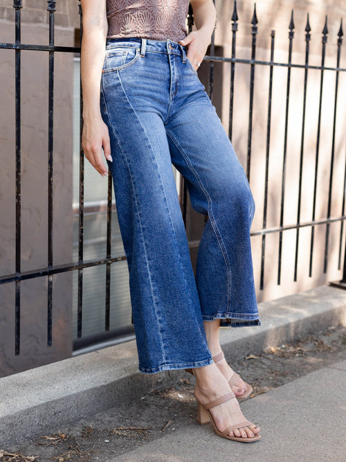 asymmetrical step hem denim jeans
