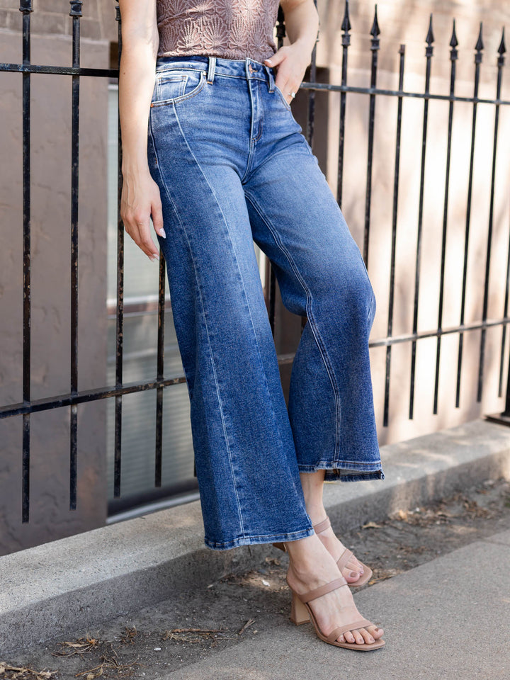 asymmetrical step hem denim jeans