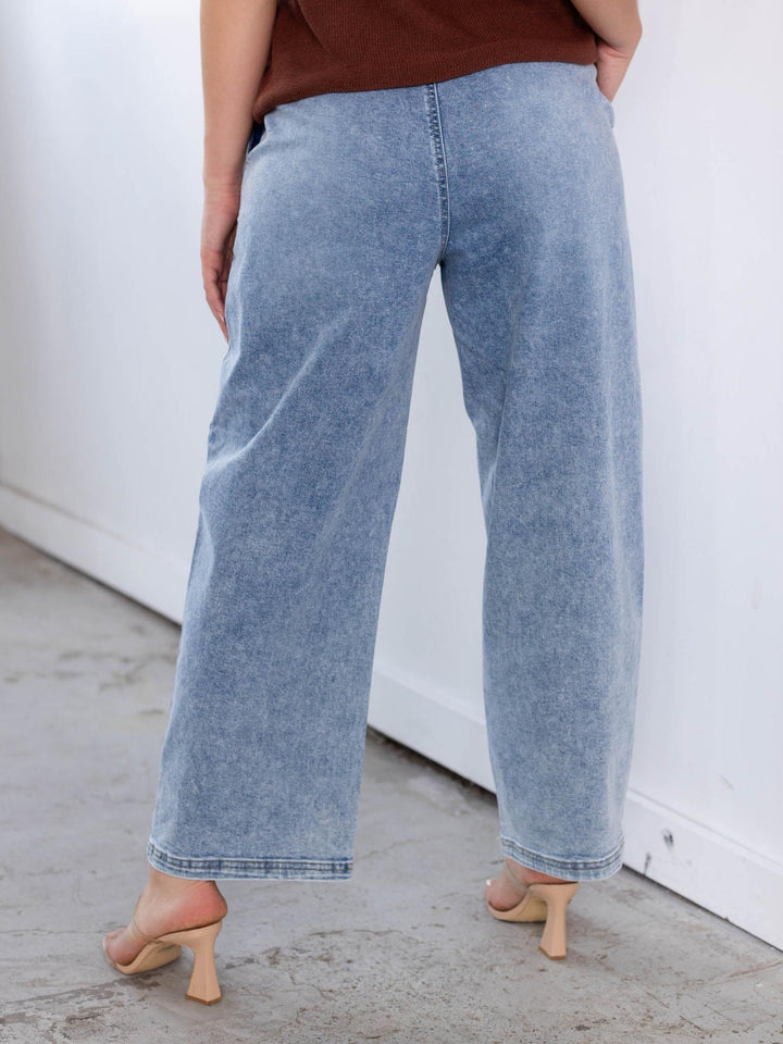 RISEN light wash slouchy crop barrel seam detail jeans with a relaxed fit.