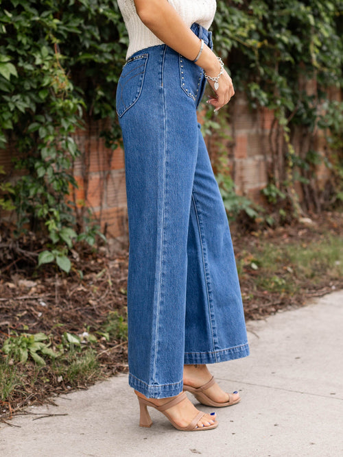 studded medium wash flared denim