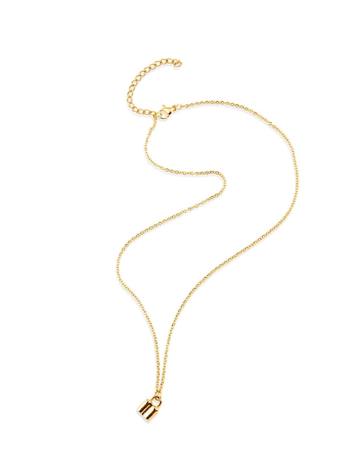 Gold necklace with a small pendant on a white background