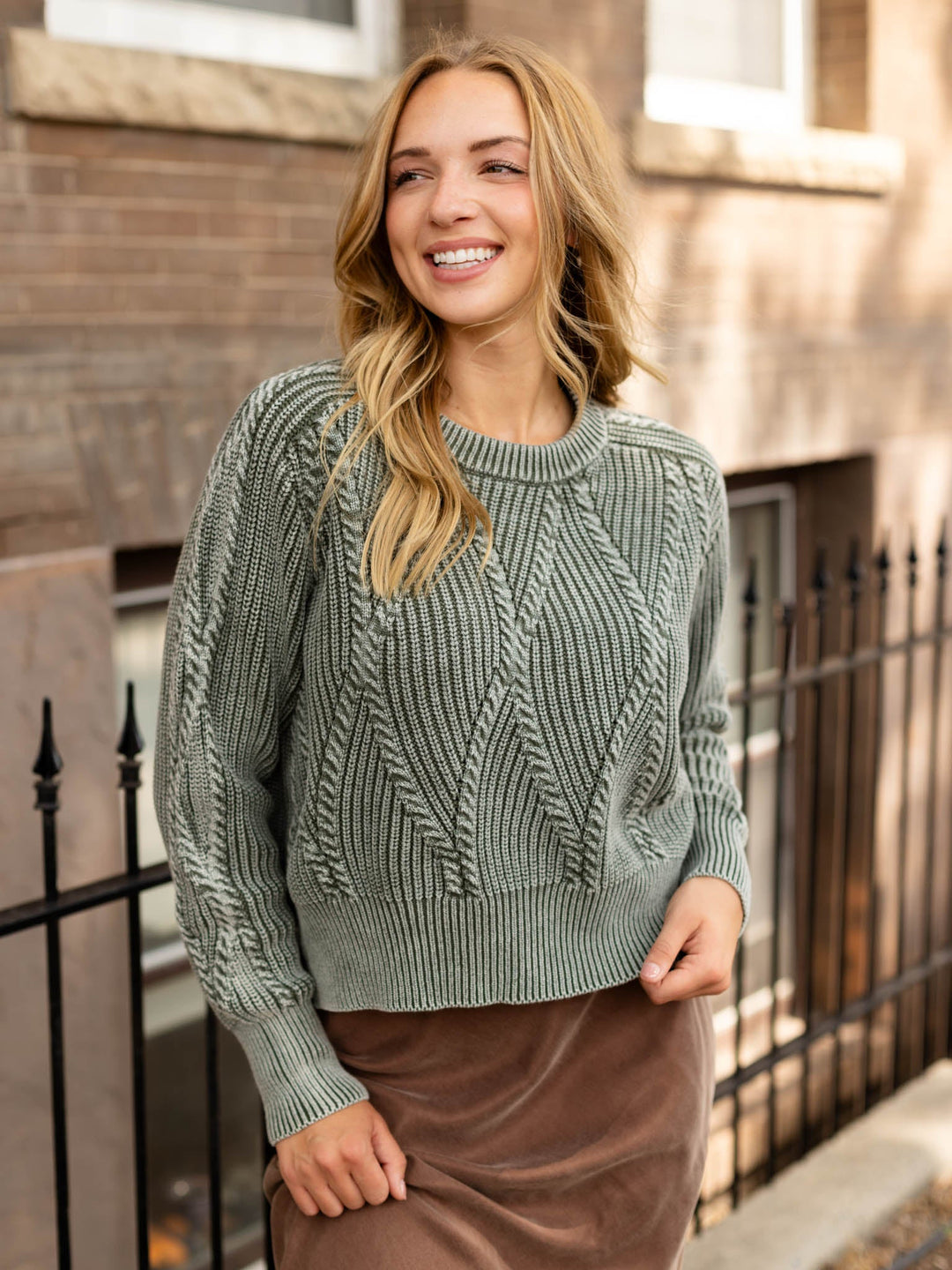 green sweater