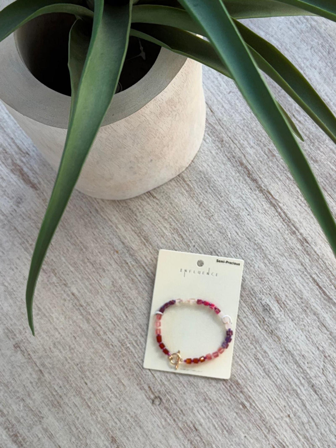 pink colored stone bracelet