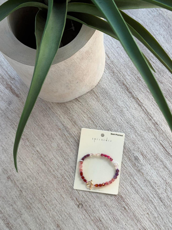 pink colored stone bracelet