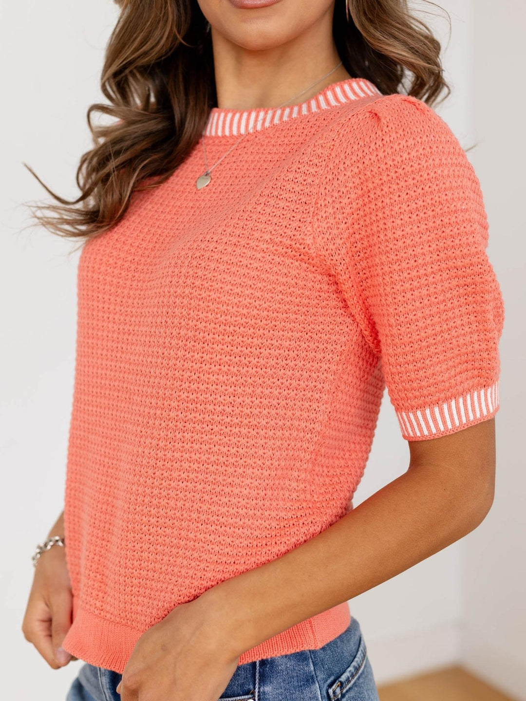 orange textured short sleeve sweater