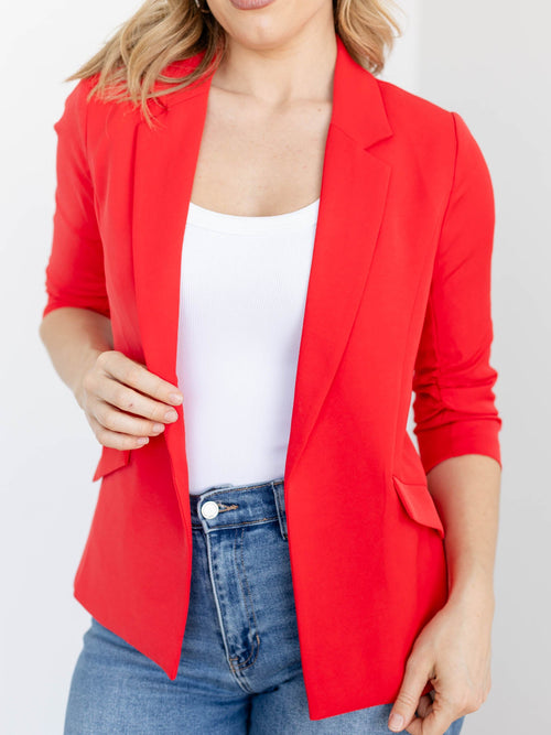 bold red ruched sleeve blazer