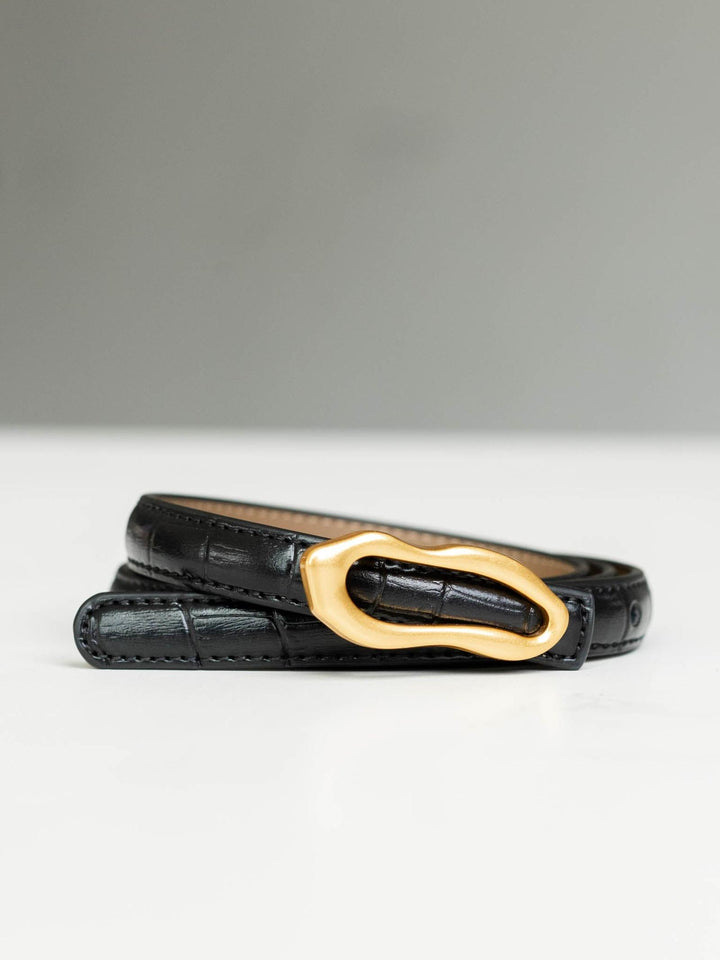 Black skinny croco-embossed leather belt with a gold asymmetrical buckle.