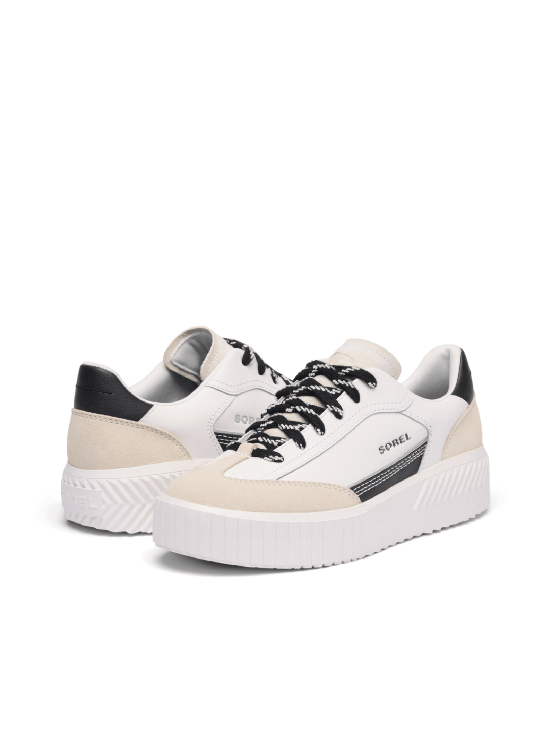White sneakers with black accents on a white background