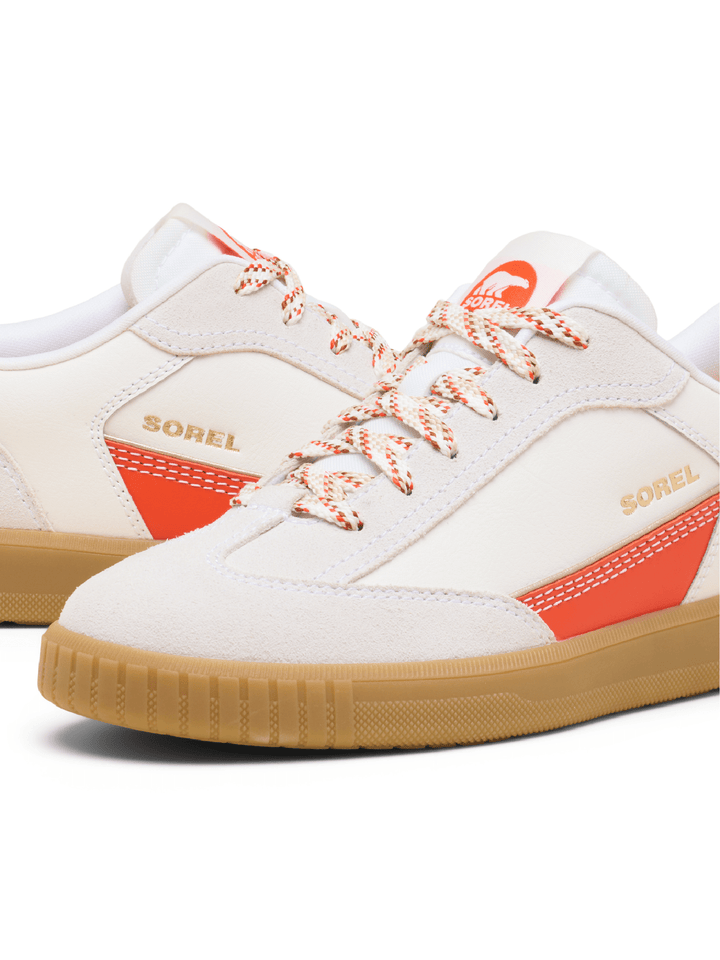 White and orange sneaker with &