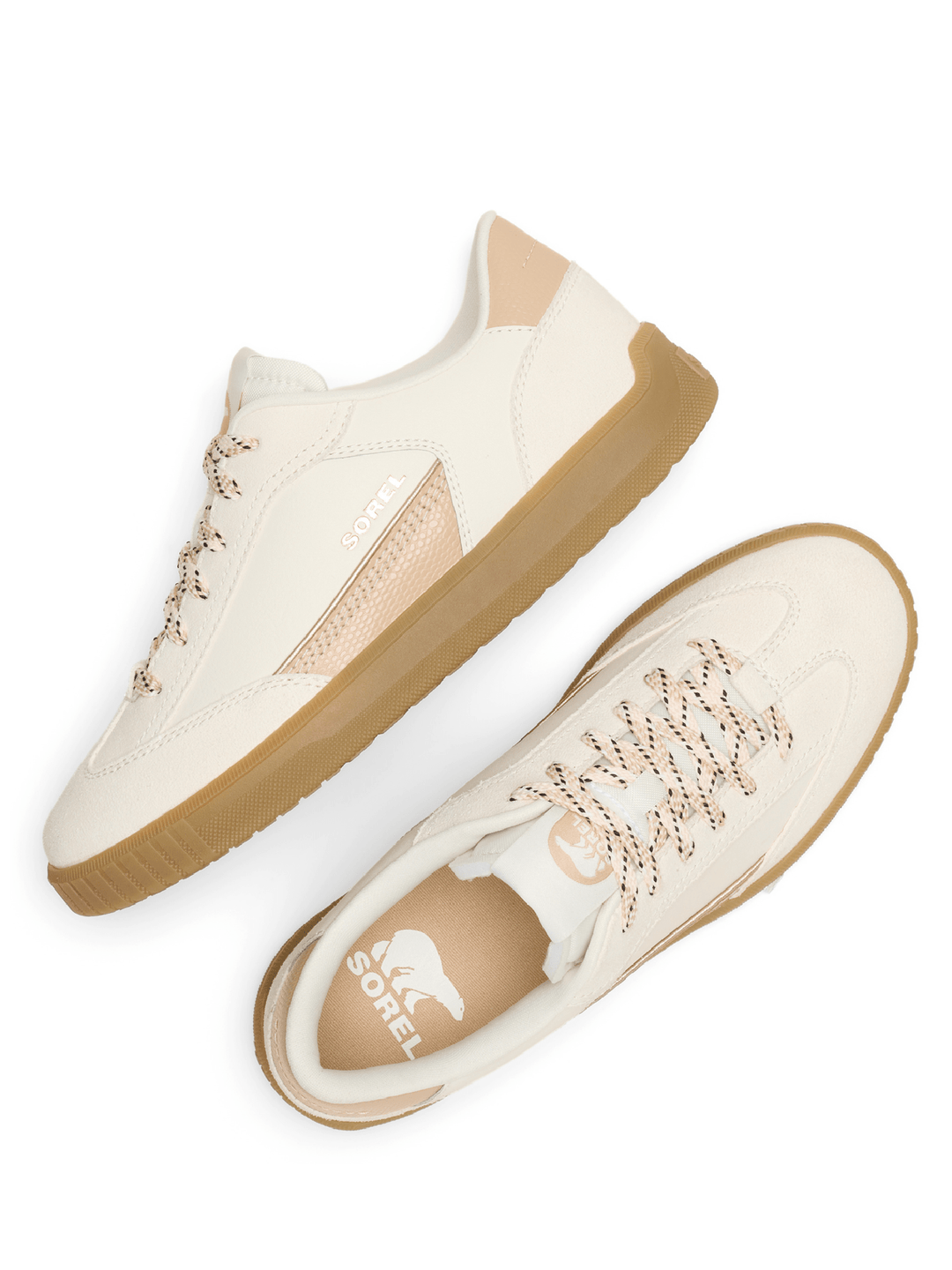 Pair of white sneakers with brown soles on a white background