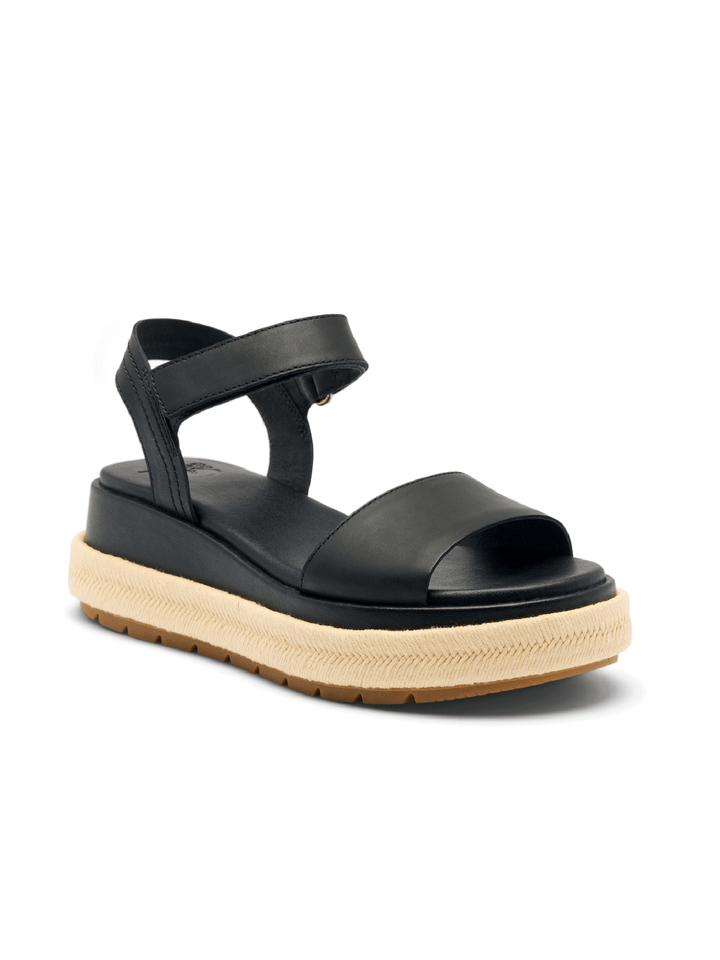 Black sandal with a thick beige sole on a white background
