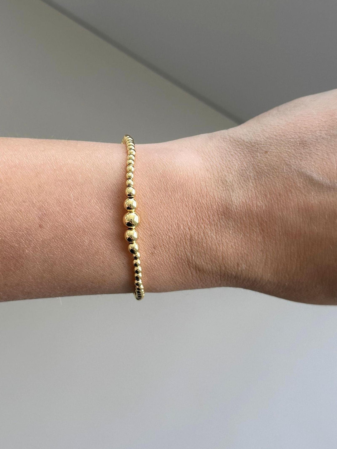 gold beaded bracelet