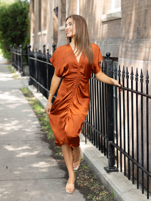 rust satin ruched midi dress