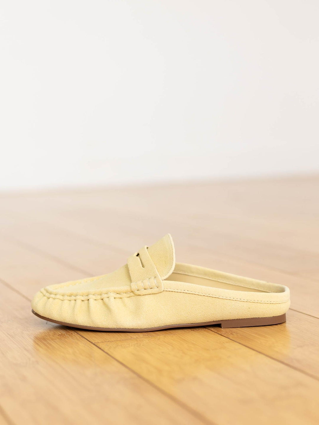 butter yellow suede slide