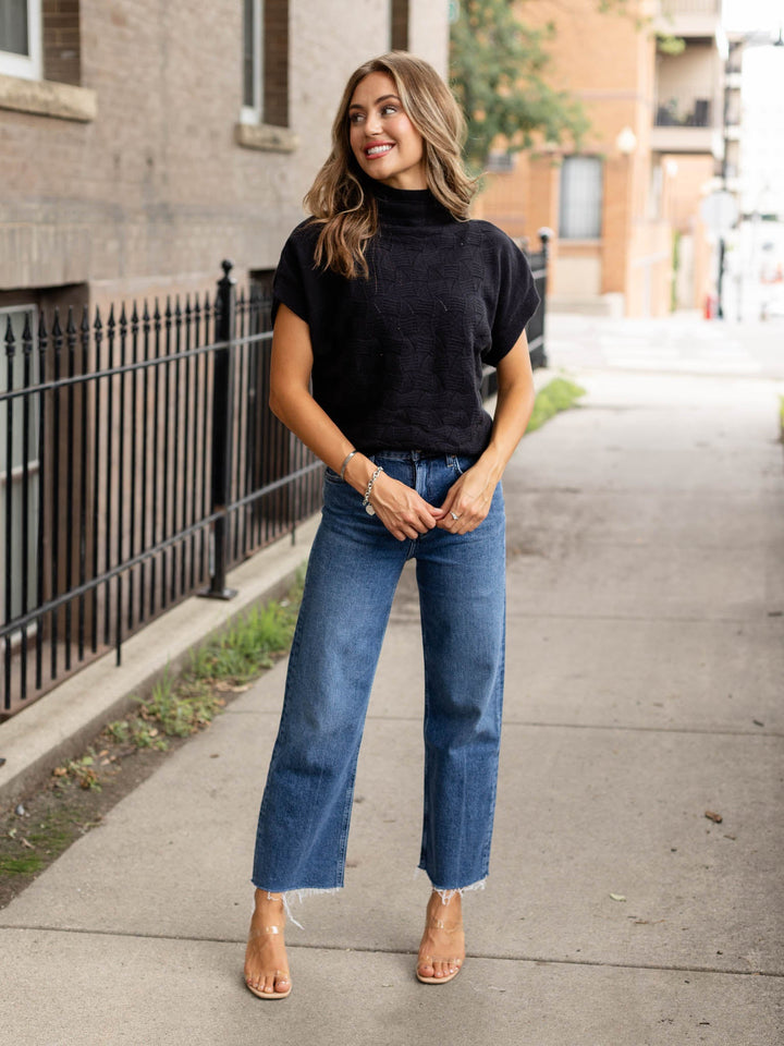 black textured short sleeve sweater