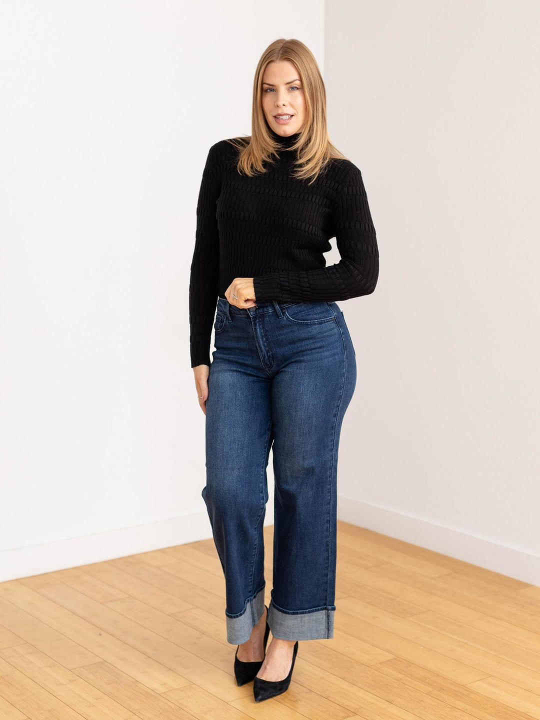 black textured mock neck top