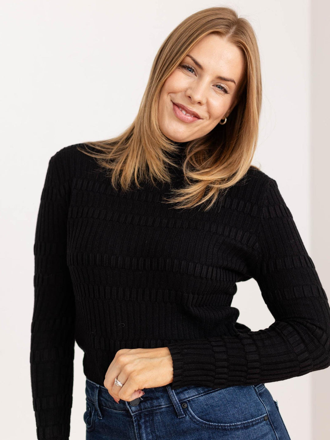 black textured mock neck top