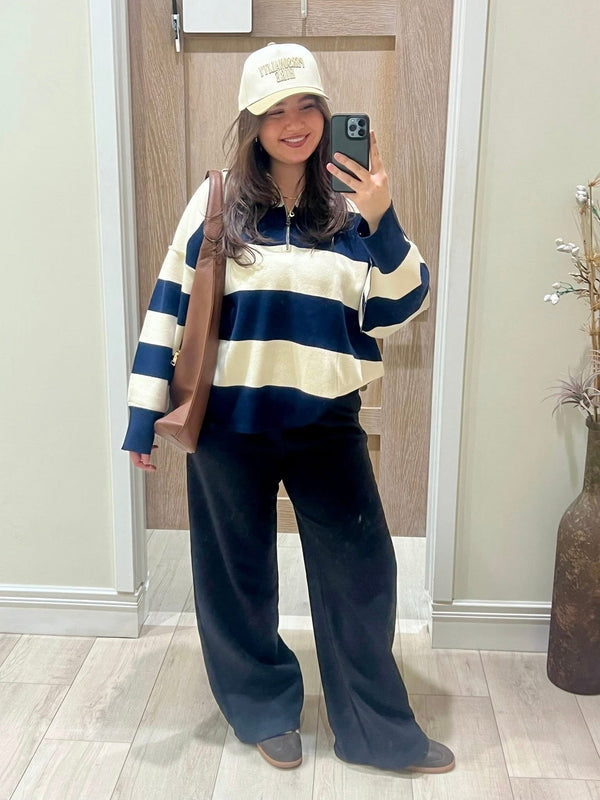 navy blue and cream striped half zip with navy blue trousers