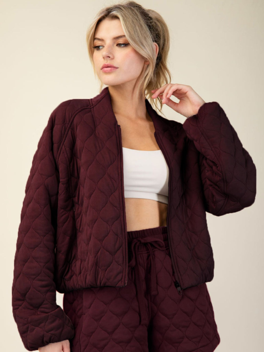 dark red quilted bomber jacket