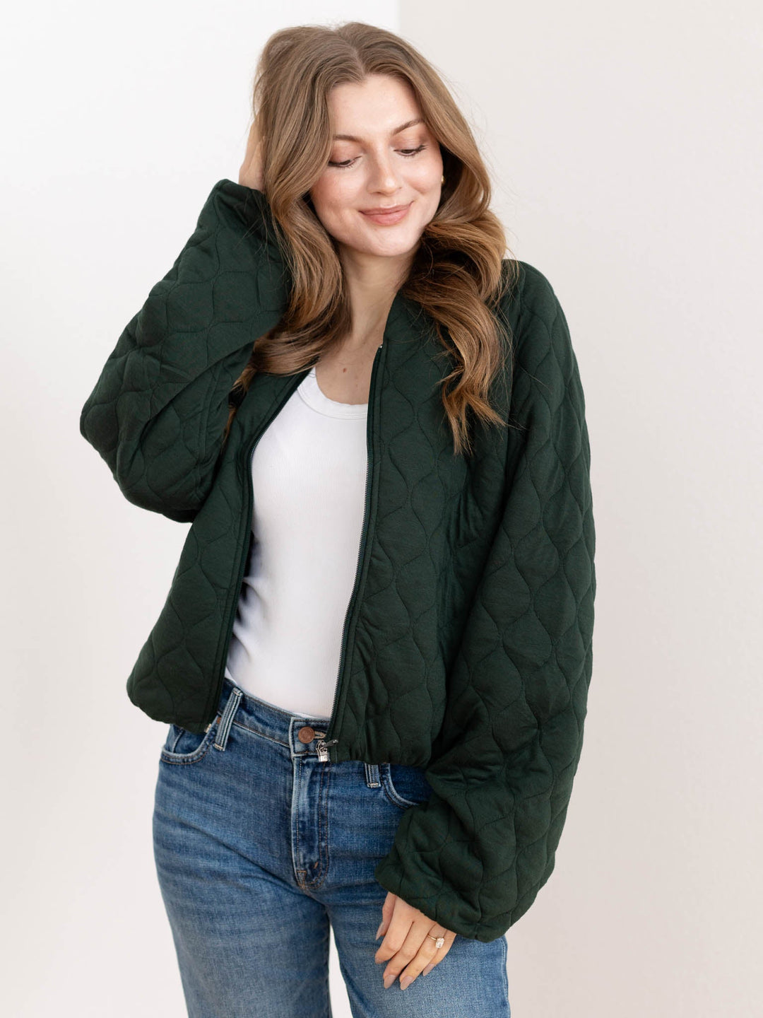 dark green quilted bomber jacket