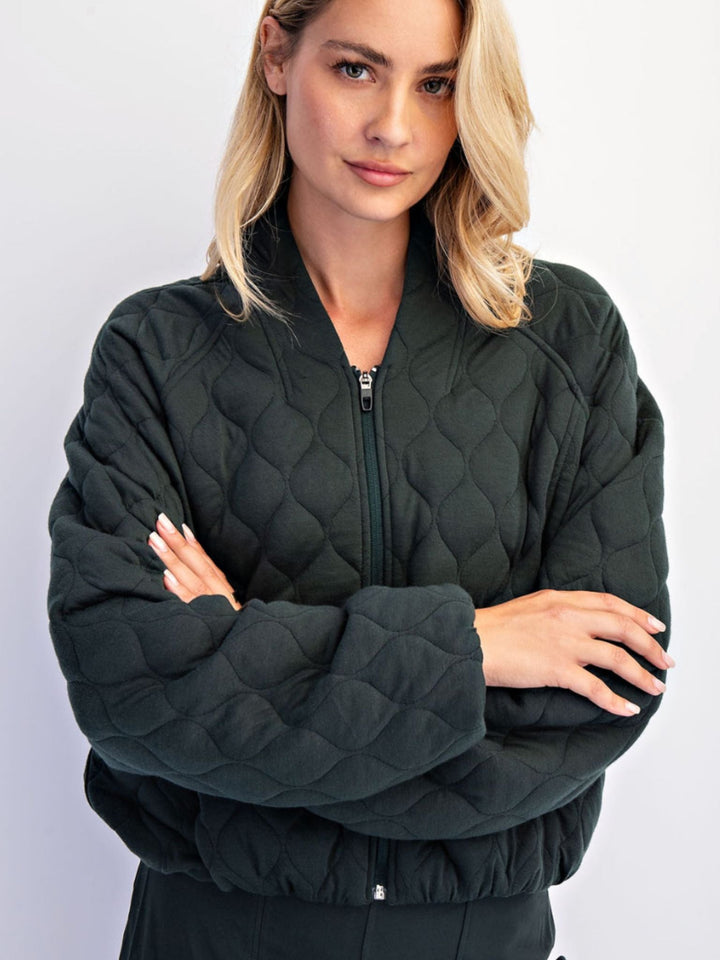 green quilted jacket