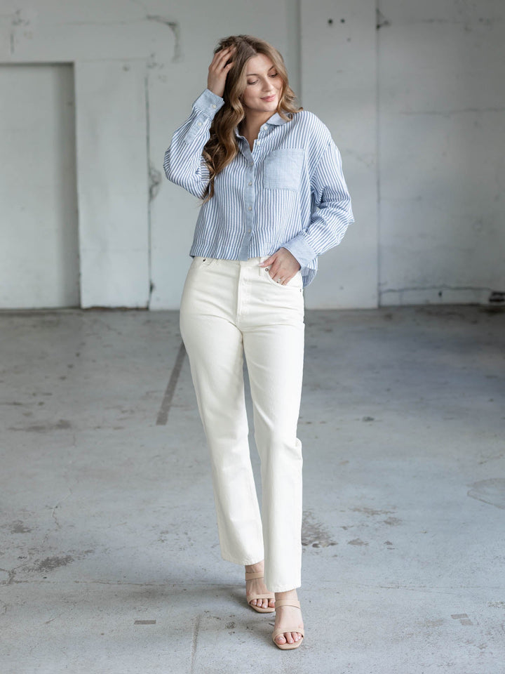 white and blue cropped long sleeve blouse