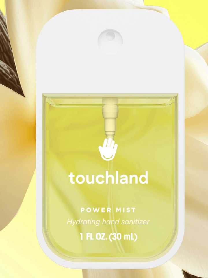 Touchland power mist hydrating hand sanitizer with a white cap on a yellow background