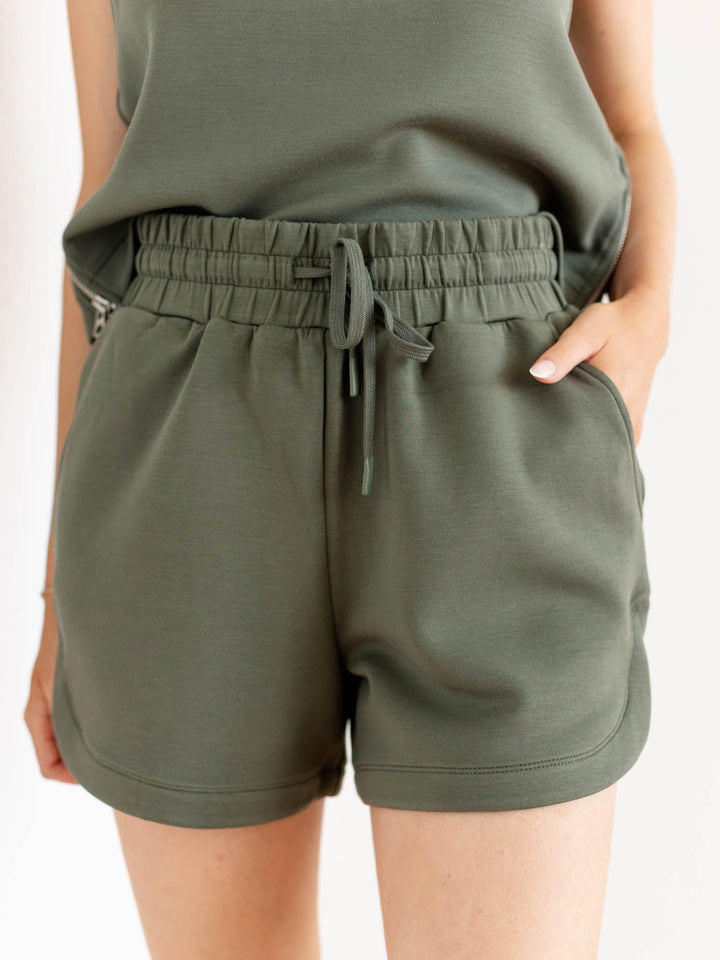 green drawstring athleisure shorts
