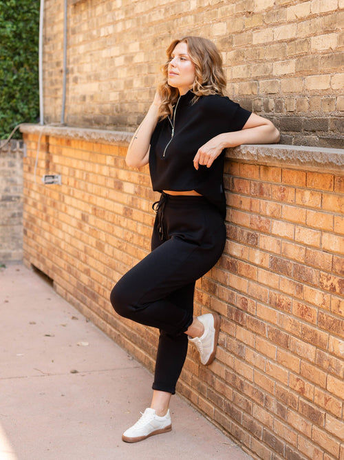 black half zip short sleeve sweatshirt