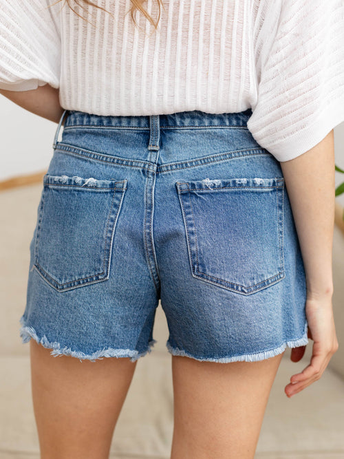 frayed hem medium wash denim shorts
