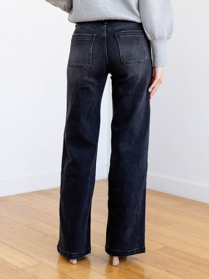 washed black patch pocket jeans