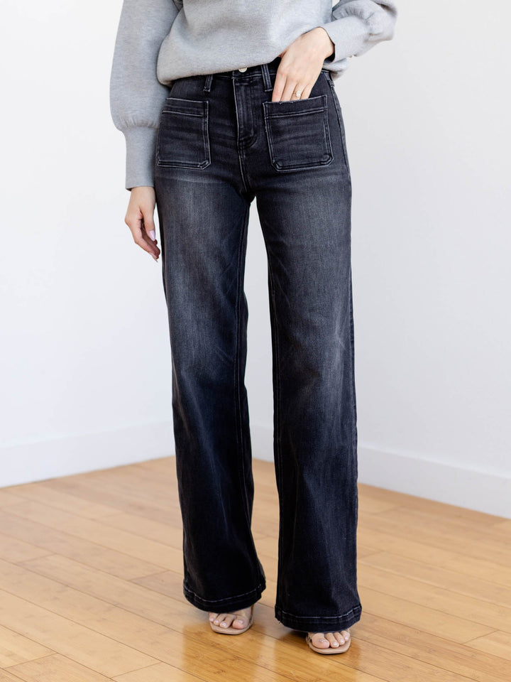 washed black patch pocket jeans