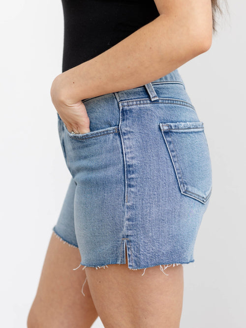 long inseam medium wash shorts