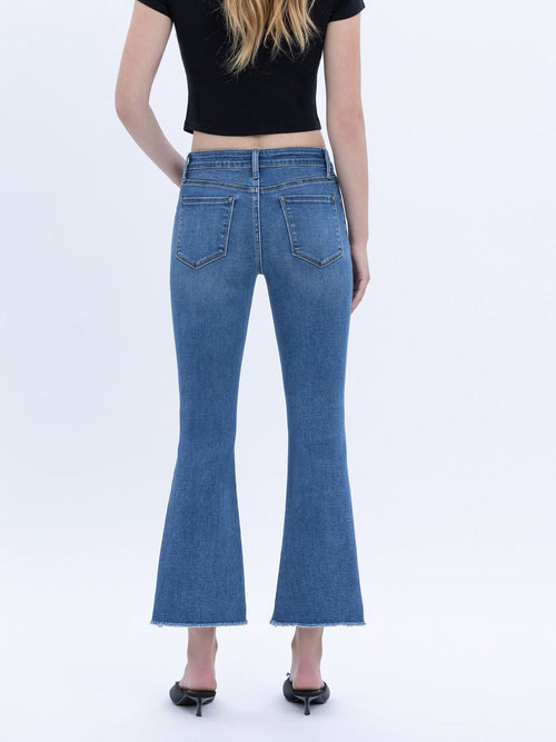 medium wash cropped flared denim jeans